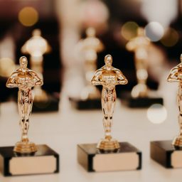 oscar-award-prize-for-victory-golden-trophy-success-concept-horizontal-shot.jpg