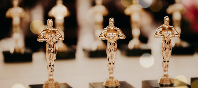 oscar-award-prize-for-victory-golden-trophy-success-concept-horizontal-shot.jpg