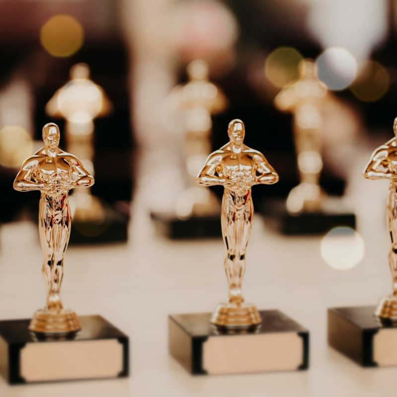 oscar-award-prize-for-victory-golden-trophy-success-concept-horizontal-shot.jpg
